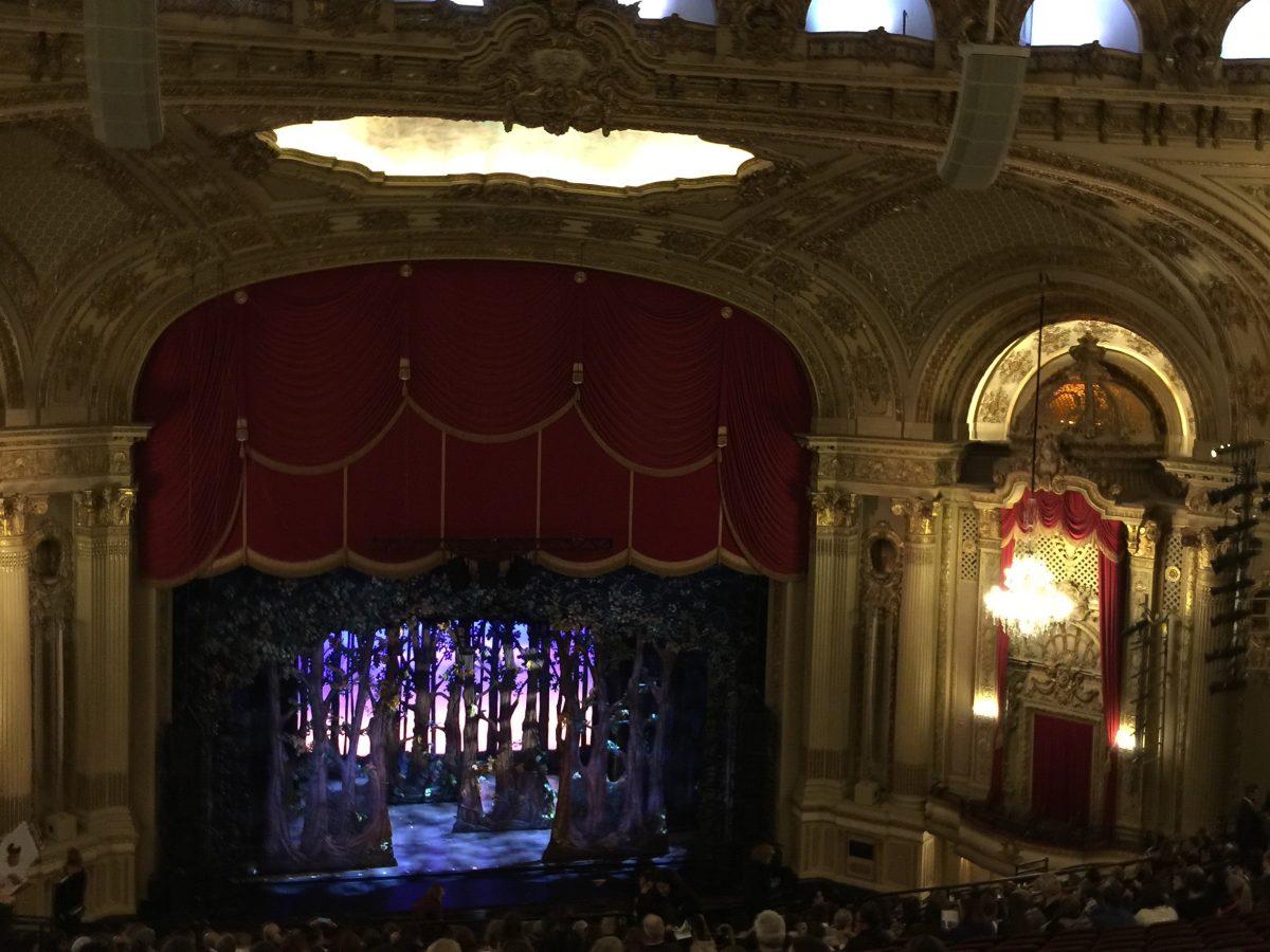 A whimsical set lights up the stage at the start of the “Cinderella,” the musical.