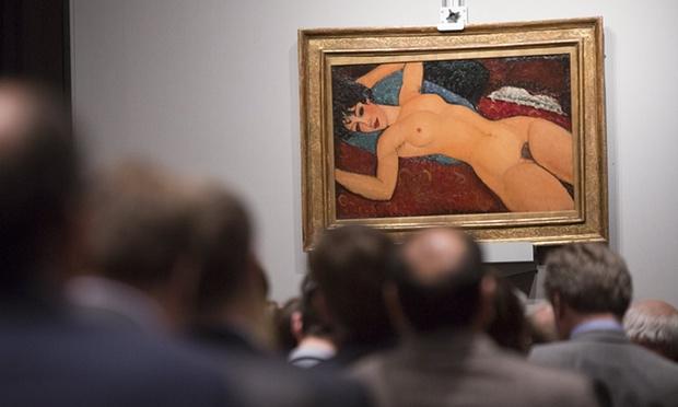 The iconic Modigliani portrait hangs for buyers to see. | Photo courtesy of theguardian.com.