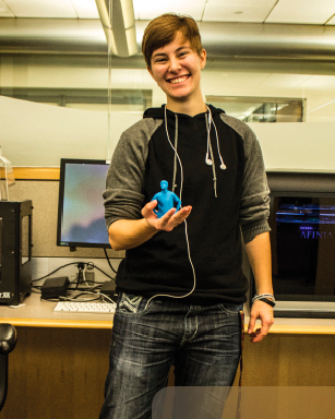 Student holds recently printed 3D sculpture. Photo by Megan Stormberg '18.