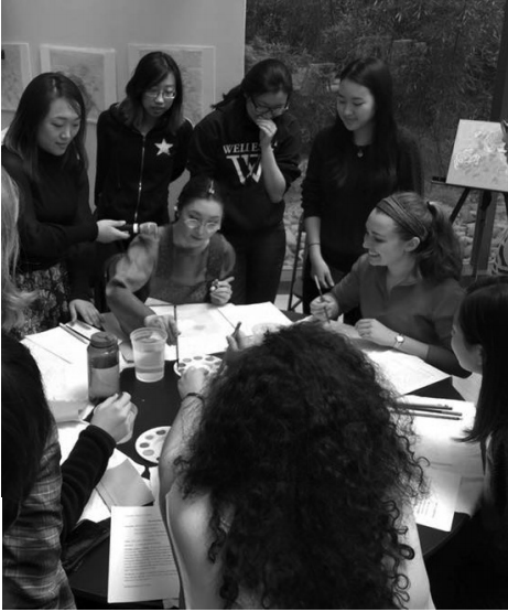 Kate Oh Trabulsi demonstrates Minhwa art to students. |Photo courtesy of Kate Oh Trabulsi.