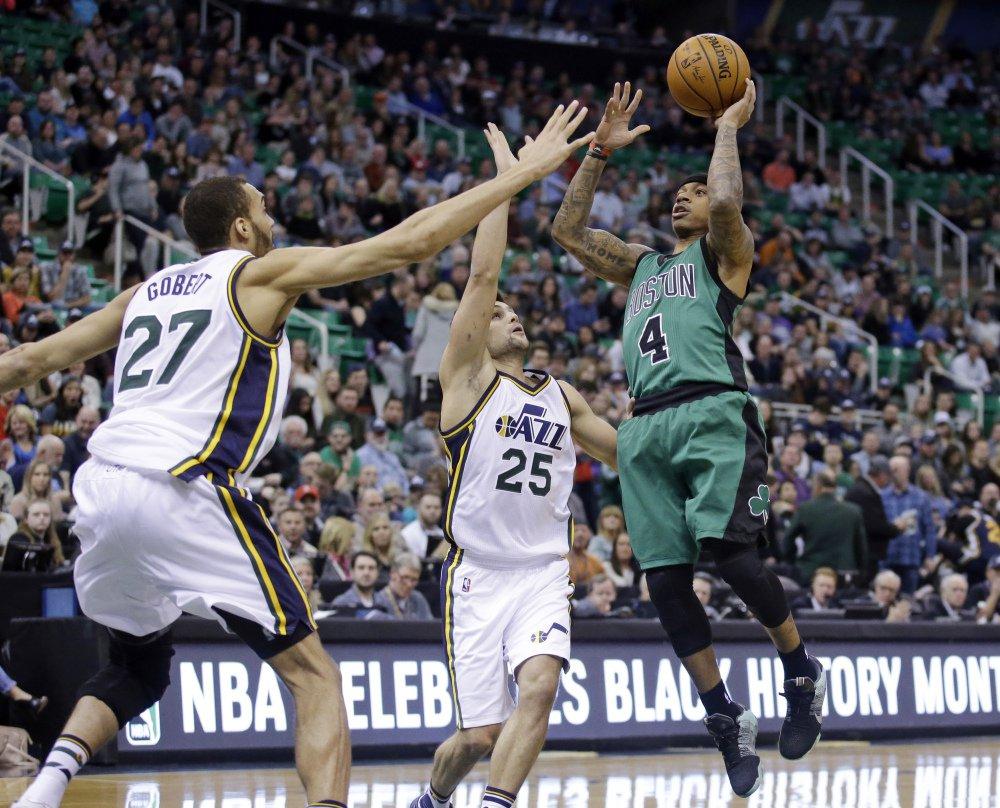 Celtics guard Isaiah Thomas as he takes a shot against the Utah Jazz.