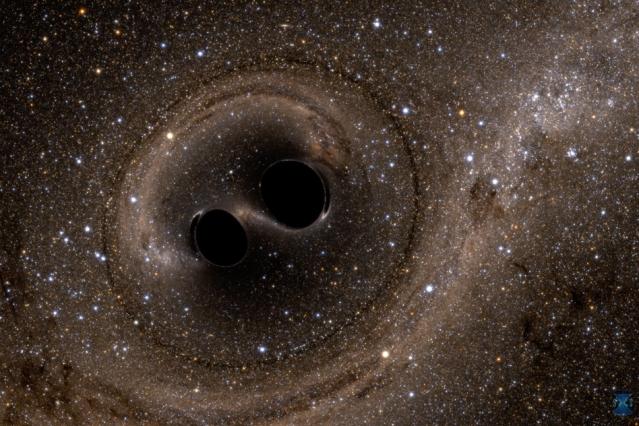 A computer simulation shows two black holes colliding. | Image courtesy of MIT News.