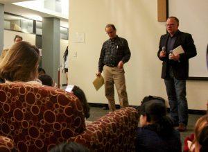 Political Science Professor Tom Burke and Economics Professor David Lindauer discuss the debate with students. Photo by Michelle Lu '18