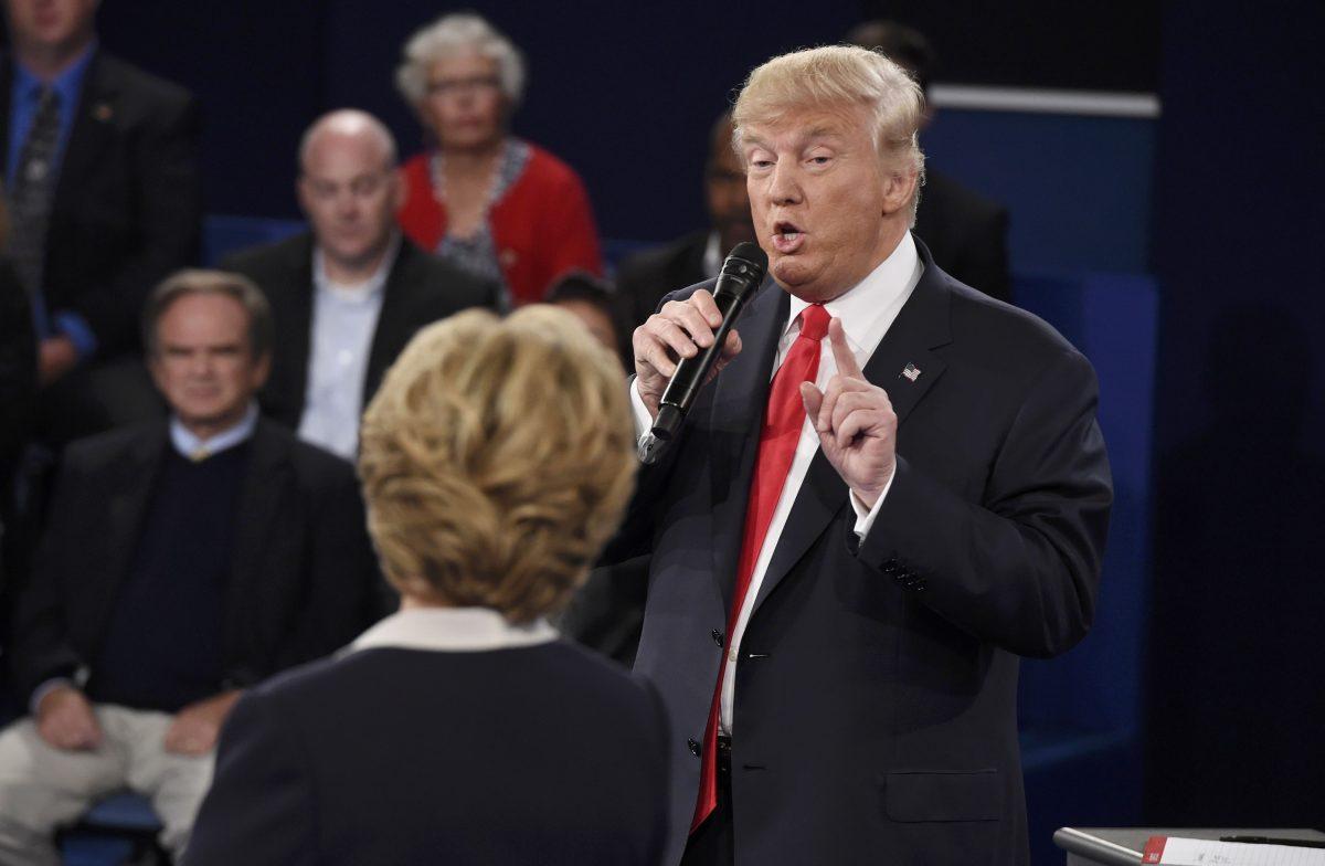 Republican U.S. presidential nominee Donald Trump speaks during the presidential town hall debate with Democratic U.S. presidential nominee Hillary Clinton at Washington University in St. Louis, Missouri, U.S., October 9, 2016. 
Photo courtesy of  Reuters/Saul Loeb