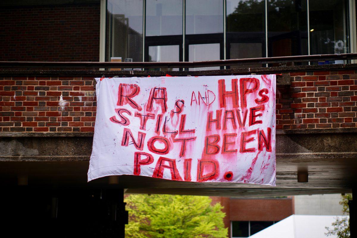 A handmade banner hangs above the Jewett staircase
Photo by Maggie Calmber '18, Contributing Photographer