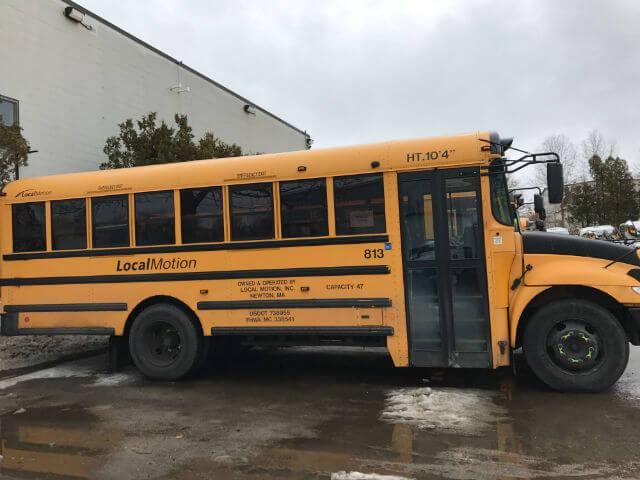 The Local Motion bus fleet includes some coach buses and some school buses Photo Courtesy of Local Motion of Boston