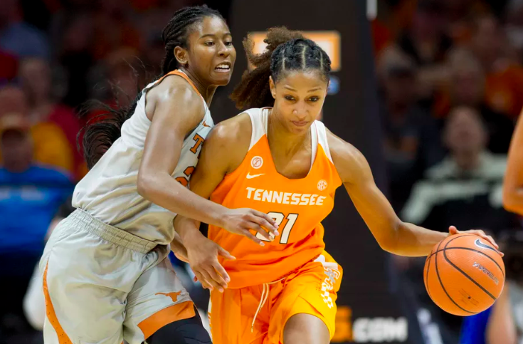 Ariel Atkins andJaime Nared play in a college basketball game. Photo courtesy of AP.