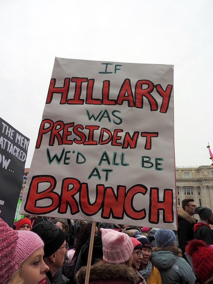 Sign at a protest that states, "If Hillary was president we'd all be at brunch"