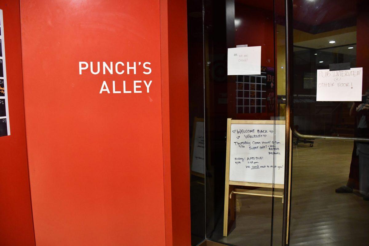 Punch's Alley displays a welcome back sign at its front door. Photo courtesy of Hannah Hirsch.