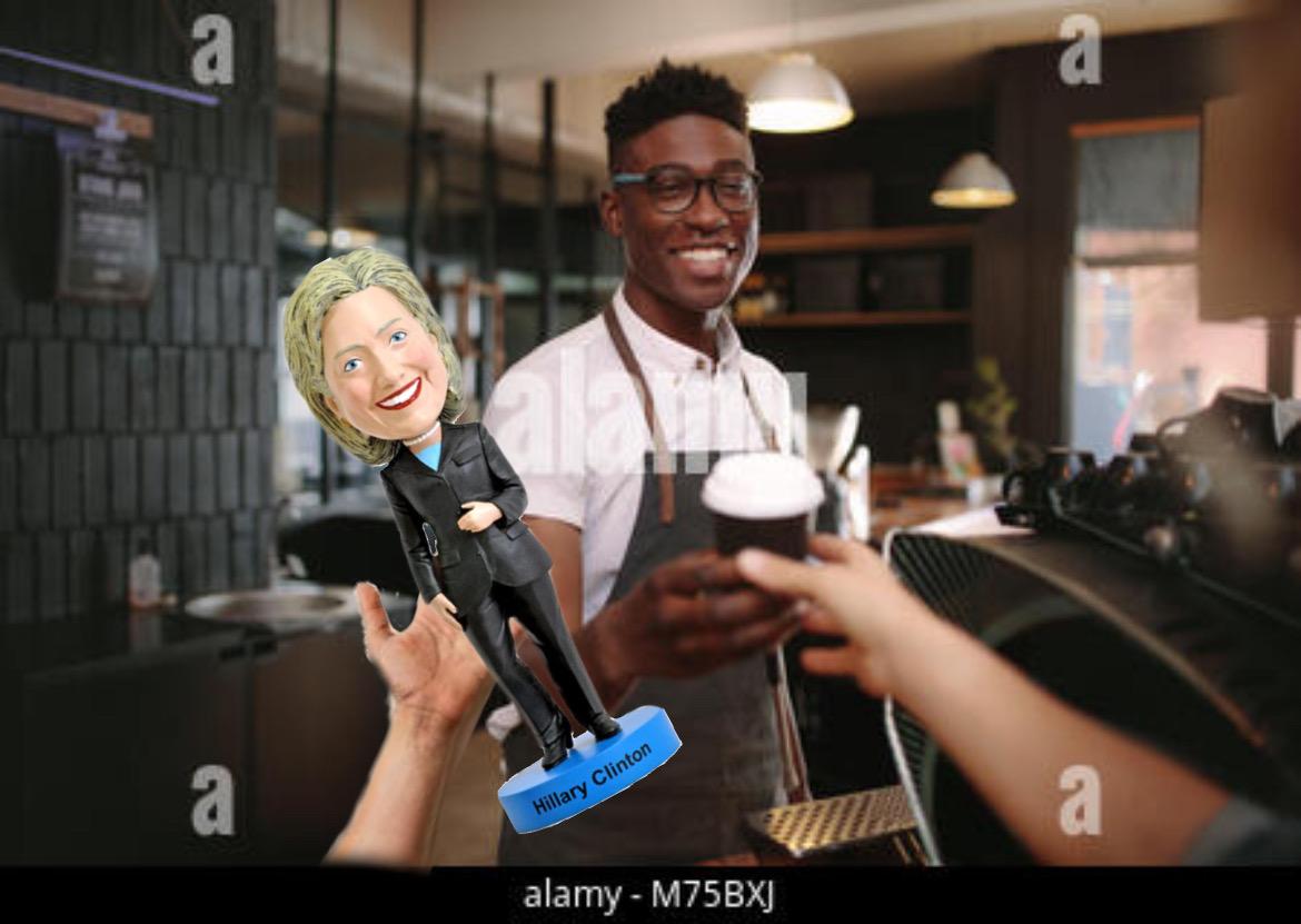 Exchanging Hillary bobblehead for Starbucks. Courtesy of Rebecca Birnbach