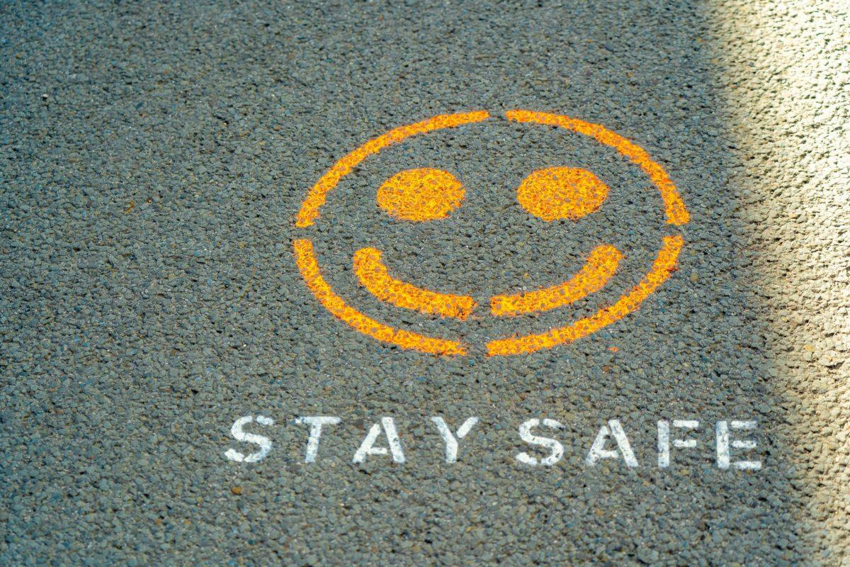 Yellow Smiley Face with "stay safe" under it