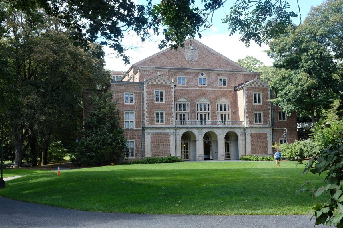 Picture of the side of Alumni Hall on Wellesley's campus on a sunny day