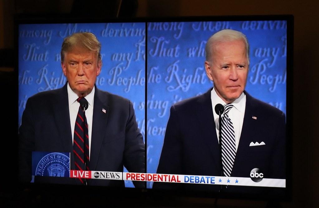 Image from a newscast showing Trump on the right and Biden on the Left