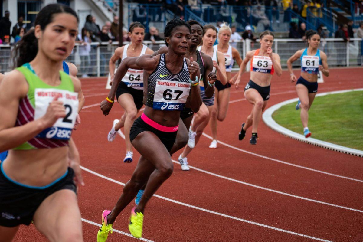 Female athletes racing in track and field